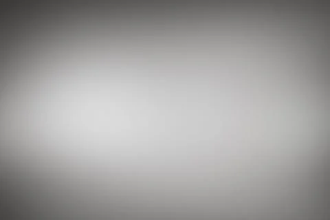 Flat design gray gradient background is shifting from dark edges to lighter Stock Photos