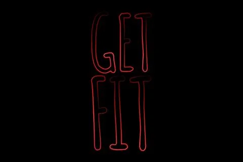 Flat design illustration displaying glowing red GET FIT neon sign on solid black Ilustración de archivo