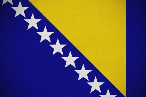 Flat design national flag is featuring blue field diagonal white stars and Foto stock