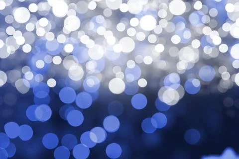 Flat design pattern is showing overlapping white and blue bokeh light circles Illustrazione stock