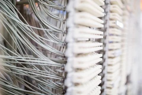 Flat design rack is showing grey cables featuring white patch blocks and cable Stock Photos
