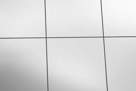 Flat design is showing close-up of light grey metal panel grid with thin dark Stock Photos
