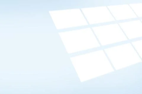 Flat design is showing stylized white twelve-pane grid floating over soft 스톡 사진