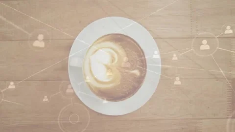 Flat design showing white ceramic coffee cup hovering on wood table with network Stock Footage 329980099