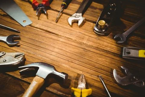 Flat design vector illustration is depicting hand tools arranged on wooden Stock Photos