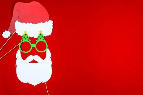 Flat designed funny Santa with red Santa's hat, Santa's beard and hipster gre Stock Photos
