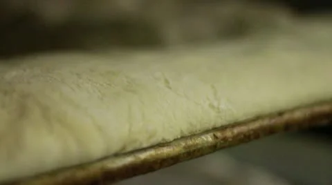 Flat dough CU stacked shallow focus Stock Footage 9455311