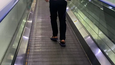 The flat elevator going up to second floor at local market mall Stock Footage 256197543