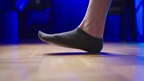 Flat feet in socks step in frame slow motion 4K Video stock 280296054