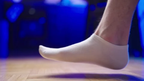 Flat feet in socks step in frame slow motion 4K Stock Footage 280296241
