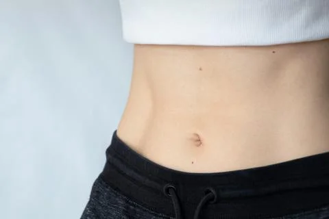 Flat female belly Stock Photos