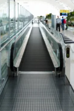 Flat floor escalator Stock Photos