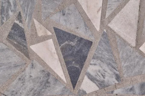 Flat floor or wall surface with granite tiles. Stock-Fotos