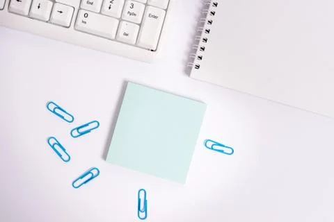Flat lay above blank paper for text messages. Empty note paper on the white Stock Photos
