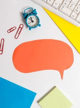 Flat lay above table with copy space on the bubble paper with clock and paper Stock Photos