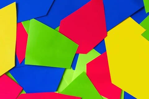 Flat lay of abstract colored paper and pastel paper background. Colorful brig Stock Photos