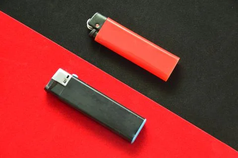 Flat lay and copy space. At the junction of the black and red background lies a Stock Photos