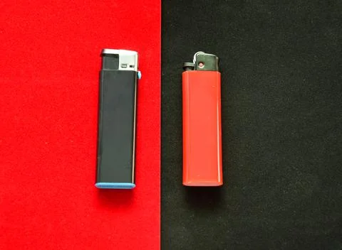 Flat lay and copy space. At the junction of the black and red background lies a Stock Photos