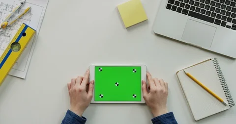 Flat lay of the architect work desk with a laptop and white horizontal tablet Video stock 96188654