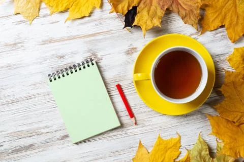 Flat lay autumn composition with cup of black tea Stock Photos