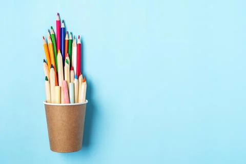 Flat lay Back to school banner with pencil in a cup of coffee. School supplie Stock Photos