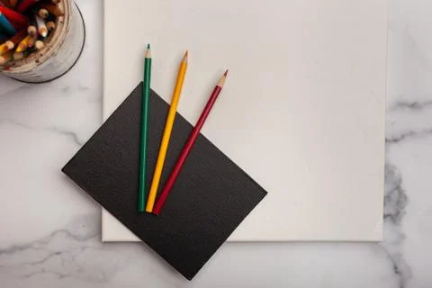Flat lay background blank white canvas with art school supplies Stock Photos