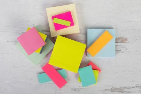 Flat lay background design stacked colorful posted sticky notes Stock Photos