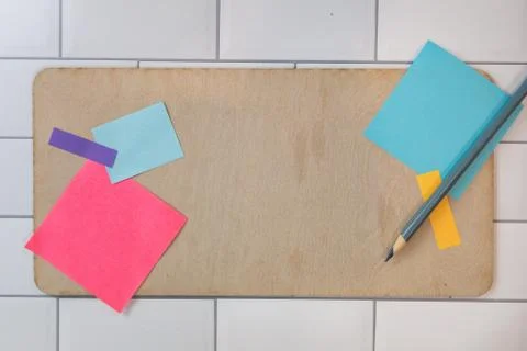 Flat lay background with posted notes no words and pencils Stock Photos