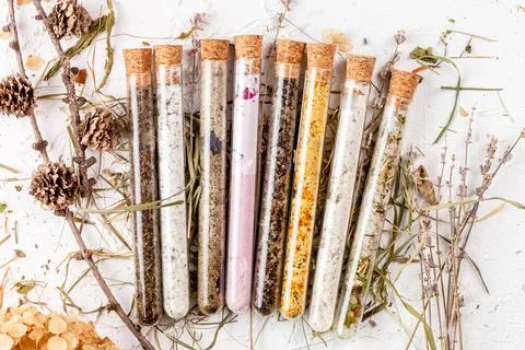 Flat lay of bath salts set in glass tubes Stock Photos