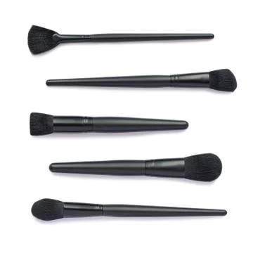 Flat lay of black makeup brushes set Stock Photos