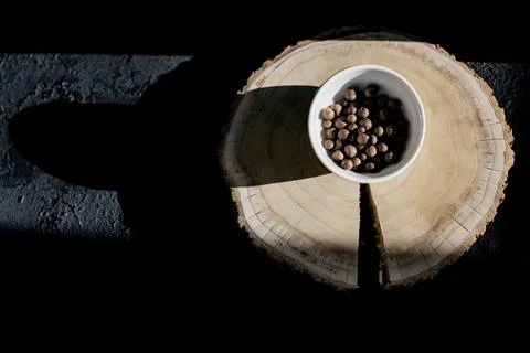 Flat lay of black peppercorns Stock Photos