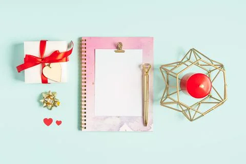 Flat lay of blank letter note pad with Valentine gift. Stock Photos