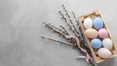 Flat lay box with colorful easter eggs copy space. High quality beautiful p.. Stock Photos