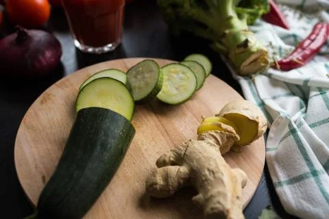 Flat lay of bread cake slices with quail eggs, herbs, cheese. Yellow cup of milk Stock Photos