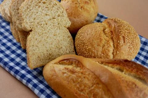 Flat lay breads on blue fabric Stock Photos