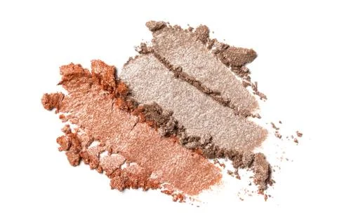 Flat lay of brush stroke. Broken shiny color eyeshadow as sample of cosmetic  Stock Photos