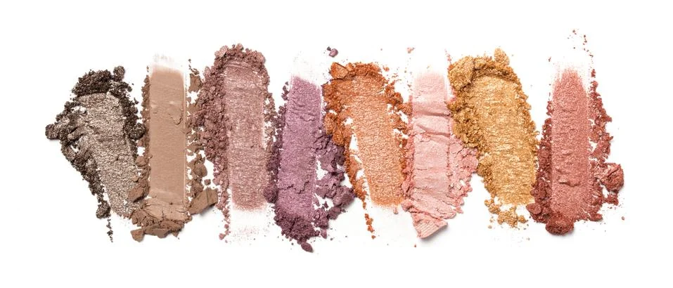 Flat lay of brush stroke. Broken shiny color eyeshadow as sample of cosmetic  Stock Photos