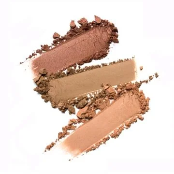 Flat lay of brush stroke. Broken brown or bronze color eyeshadow as sample of Stock Photos