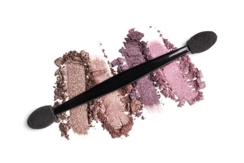 Flat lay of brush stroke. Broken shiny color eyeshadow as sample of cosmetic  Stock Photos