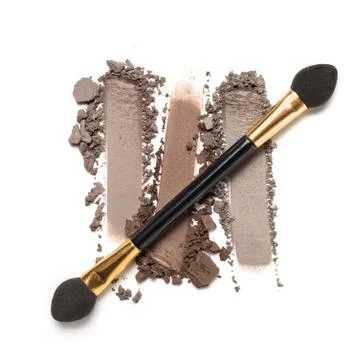 Flat lay of brush stroke. Broken color eyeshadow as sample of cosmetic beauty Stock Photos