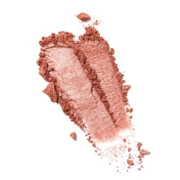Flat lay of brush stroke. Broken shiny brown or bronze color eyeshadow as sam Stock Photos