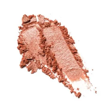 Flat lay of brush stroke. Broken shiny brown or bronze color eyeshadow as sam Stock Photos