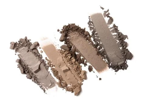 Flat lay of brush strokes. Broken color eyeshadow as samples of cosmetic beau Stock Photos
