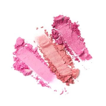 Flat lay of brush strokes. Broken shiny bright pink eyeshadow as sample of co Stock Photos