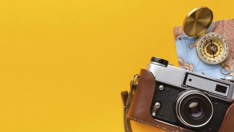 Flat lay camera compass frame Stock Photos