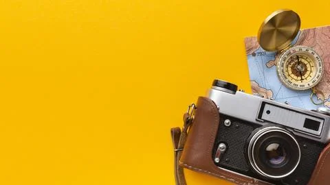Flat lay camera compass frame Stock Photos