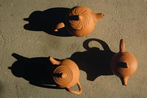 Flat lay ceramic pottery tea pots made from clay drying in the sun Stock Photos