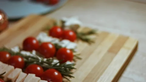 Flat lay of cheese and tomatoes. Slices of cheese, tomatoes and rozmarin Stock Footage 144225750