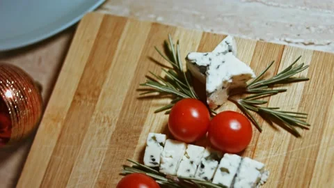 Flat lay of cheese and tomatoes. Slices of cheese, tomatoes and rozmarin Stock Footage 144226111