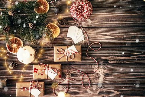 Flat lay christmas background with decorations and craft gift boxes with red  Stock Photos